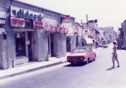 Wife crossing Girne Girne High St during Rush Hour 1984. Near the Dorana Hotel to the right. Note the two way traffic