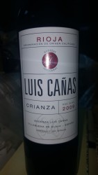 Luis Cañas Reserva is a red wine produced by Luis Cañas, in the D.O Rioja.<br /><br />The winery Luis Cañas is a family run business located in Villabuena (La Rioja Alavesa). The family has been producing wines since the 20th century.<br /><br />Luis Cañas Reserva is produced from the variety Tempranillo (95%) and Graciano (5%).<br /><br />The grapes originate from old vines, aged between 50-60 years old, low yielding vines.<br /><br />The harvest is performed using small 15kg capacity boxes, once at the winery the grapes undergo a double selection process: bunches and grapes.<br /><br />For production, the fermentation process is completed in wooden vats, the malolactic fermentation is achieved through new French (70%) and American (30%) oak barrels.<br /><br />Luis Cañas Reserva is aged in the same barrels for 24 months. Finally, Luis Cañas Reserva is left to refine in the bottle for a further additional 36 months in bottle.<br /><br />Winery<br />Luis Cañas.<br />Grapes<br />Tempranillo, Graciano, . Rioja is arguably Spain's top wine region and is one of only two regions classified under the Denominación de Origen Calificada (DOCa) system. Its two most important red grapes are Tempranillo and Garnacha.<br /><br />Although red wines from Rioja are prized, Spanish wines generally offer great bang for the buck, allowing one to indulge in quality vino without breaking the bank!<br /><br />There are four categories of red wine in Rioja. The youngest of these is “Joven”. “Crianza” wines are required to age for a minimum of 2 years, with 6 months spent in oak barrels. The next level is “Reserva” in which the wine ages for a minimum of 3 years, with at least 1 year in oak barrels. Finally, the most mature wines are labeled “Gran Reserva”. These wines mature for minimum 2 years in oak barrels, followed by at least 3 years in the bottle.<br /><br />Typically younger wines will be lighter in body style, exhibit more fresh fruit characteristics and are suitable to drink while young. Older wines have more developed flavor profiles, earthy characteristics, and are better suited to aging.<br /><br />The medium body and high acidity in Spanish red wines from Rioja makes them excellent for pairing with a variety of foods. The approachable price points makes these wines of outstanding quality, readily available to enjoy sans guilt.
