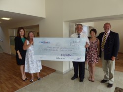 KIBKOM cheque presentation to The RBL